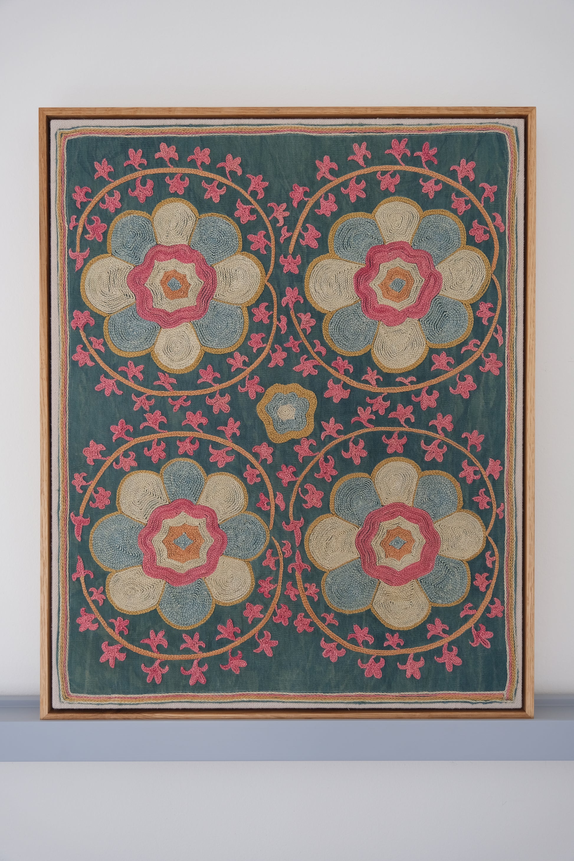 Framed suzani, embroidered textile art, wooden frame, green with florals
