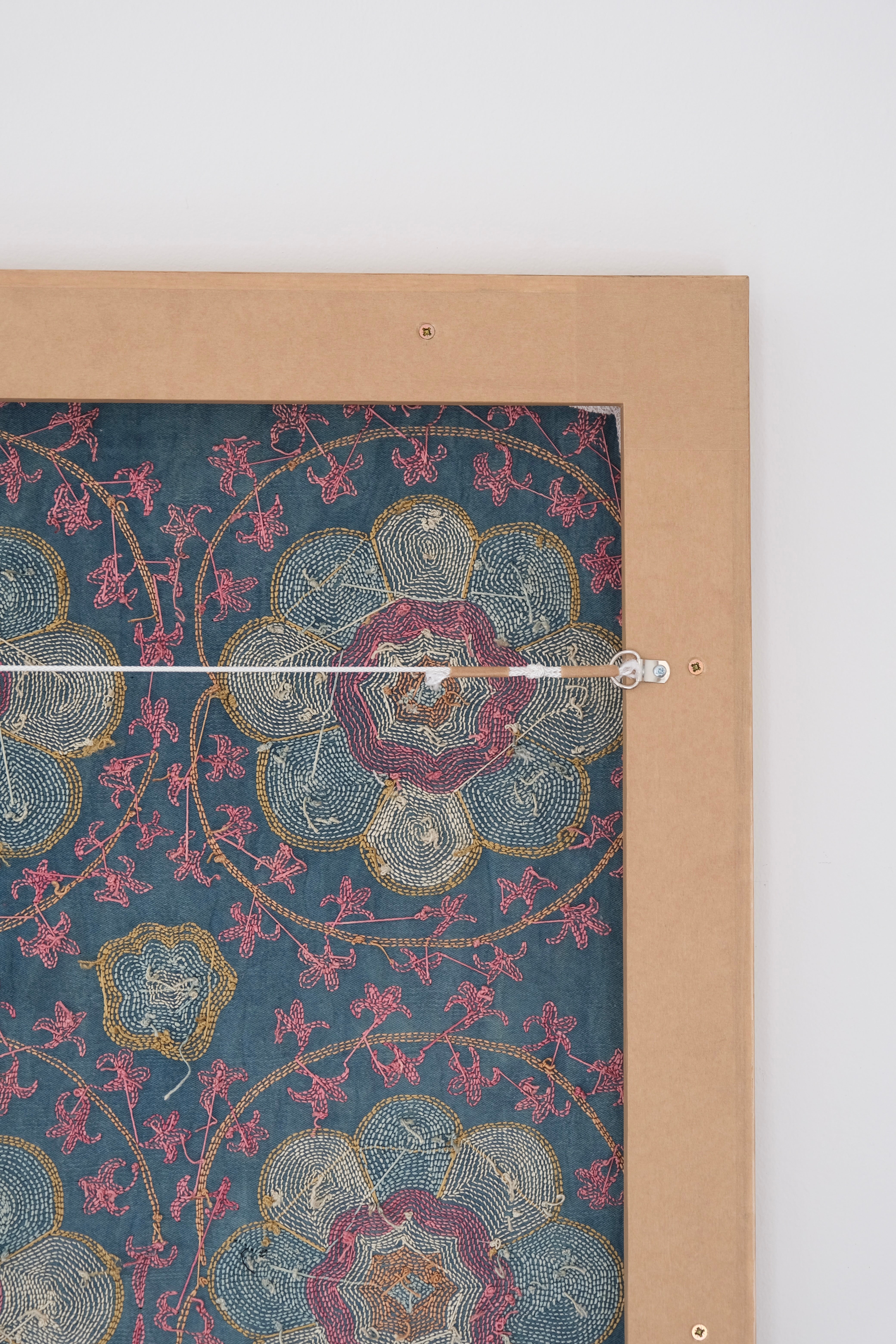 Framed suzani, embroidered textile art, wooden frame, green with florals, backside