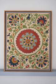Framed suzani, embroidered textile art, wooden frame, white with green, blue and red floral design